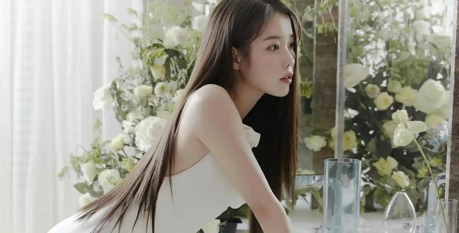 李知恩 iu,韩国演员,歌手,被称之为韩国"国民妹妹",代表作《德鲁纳酒