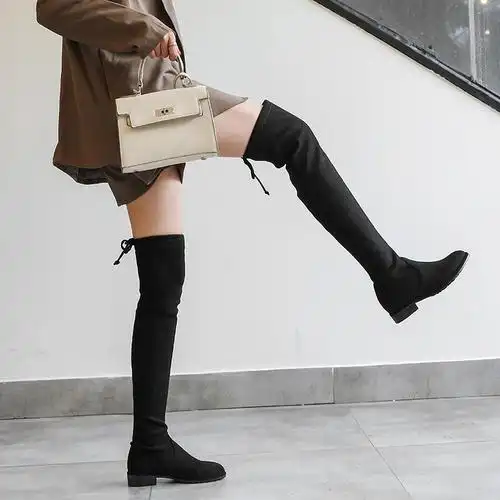 过膝长靴穿搭技巧让你秒变大长腿