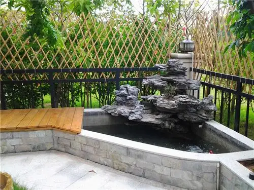 庭院鱼池假山图片