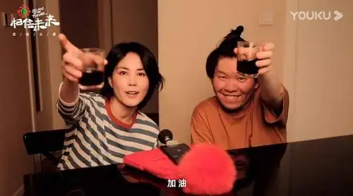 王菲和常石磊唱《人间》