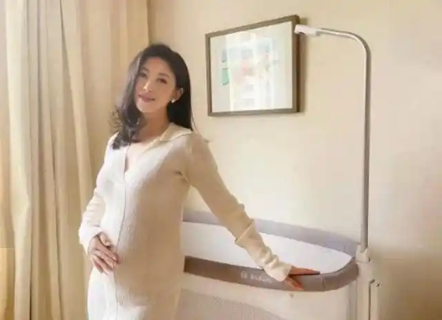 朱珠挺"超大"孕肚出镜,被疑怀了"两个娃",她是怎么做到的?