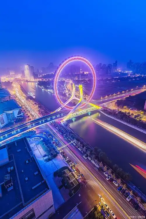 天津之眼,位于中国天津市,是一座巨大的摩天轮,同时也是眺望天津城市