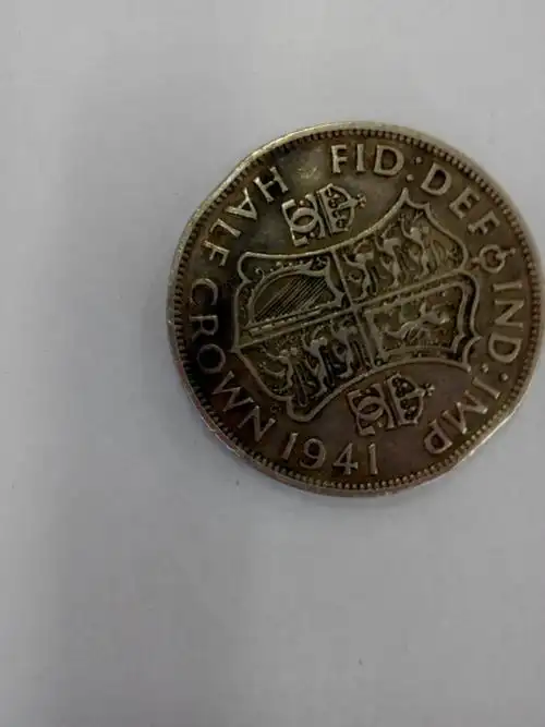 1941英国硬币头像是男人