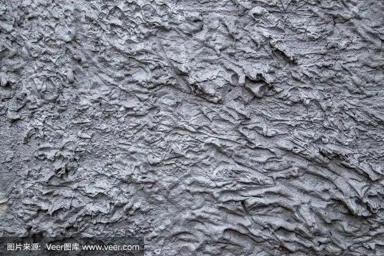 在灰泥混凝土墙的粗糙表面涂上银色.适合纹理背景和壁纸