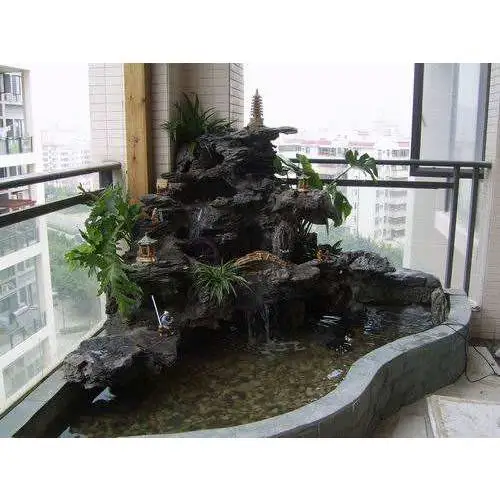 固定或人工修砌的小型假山水池水景