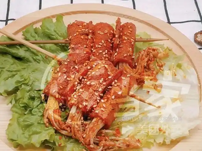 炸培根金针菇图片