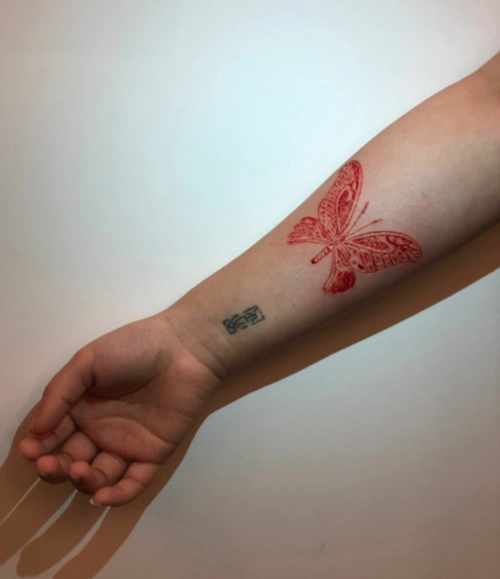 手臂蝴蝶肉雕纹身恢复图超好看的割皮纹身恢复图片欣赏3