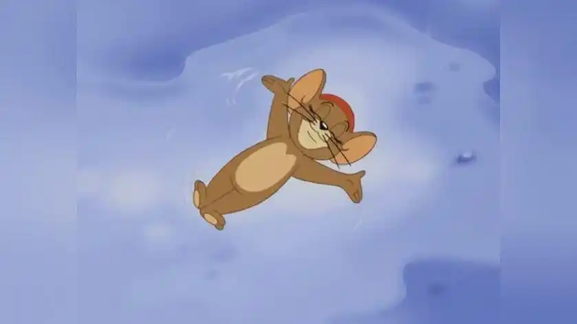 《猫和老鼠》发现外面下雪的杰瑞很开心,它在雪里开心的玩耍