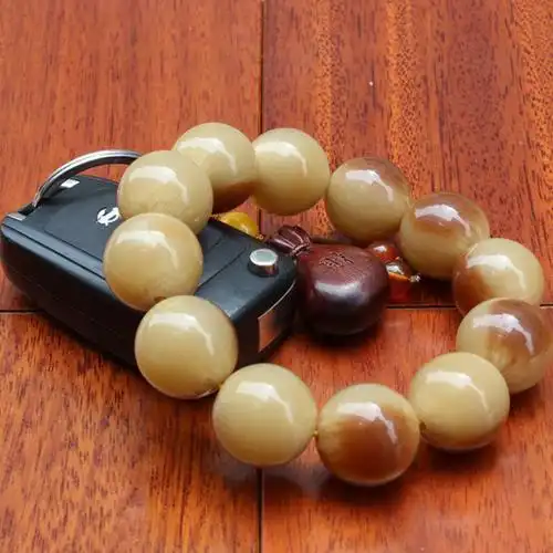 耗牛骨手串为什么是红色的呢?有没有盘玩价值?