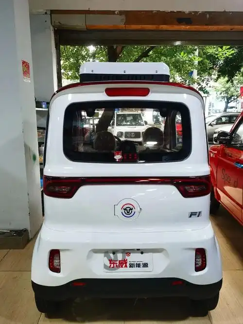 四轮低速电动车 国庆佳节! 塑件小微车,第一品牌! 东威f - 抖音