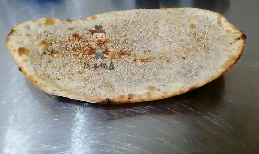 的,用了只能说是锦上添花,对公安锅盔的酥脆感并没有起到决定性的作用