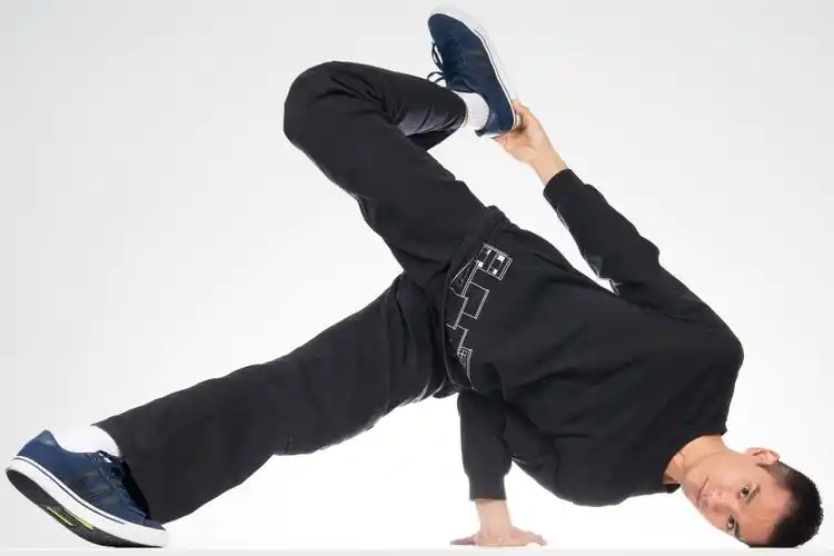 bboy holding a chair freeze