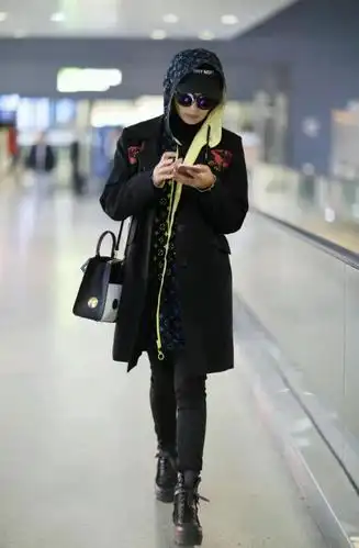 刘涛机场新造型,时尚与保暖兼备,化身霸气总裁范儿