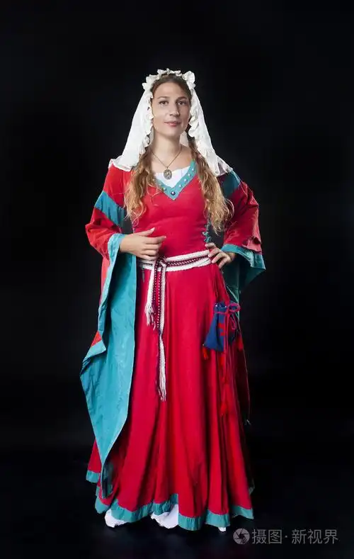 中世纪的女孩穿着红色的衣服的肖像