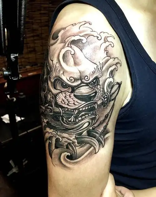 守护福狮纹身图片_成品手臂传统宗教动物纹身图案