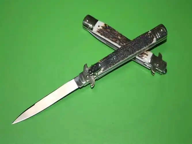 意大利akc古典跳刀双黄铜鹿角柄