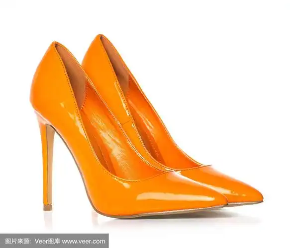 优雅的高跟鞋在橙色