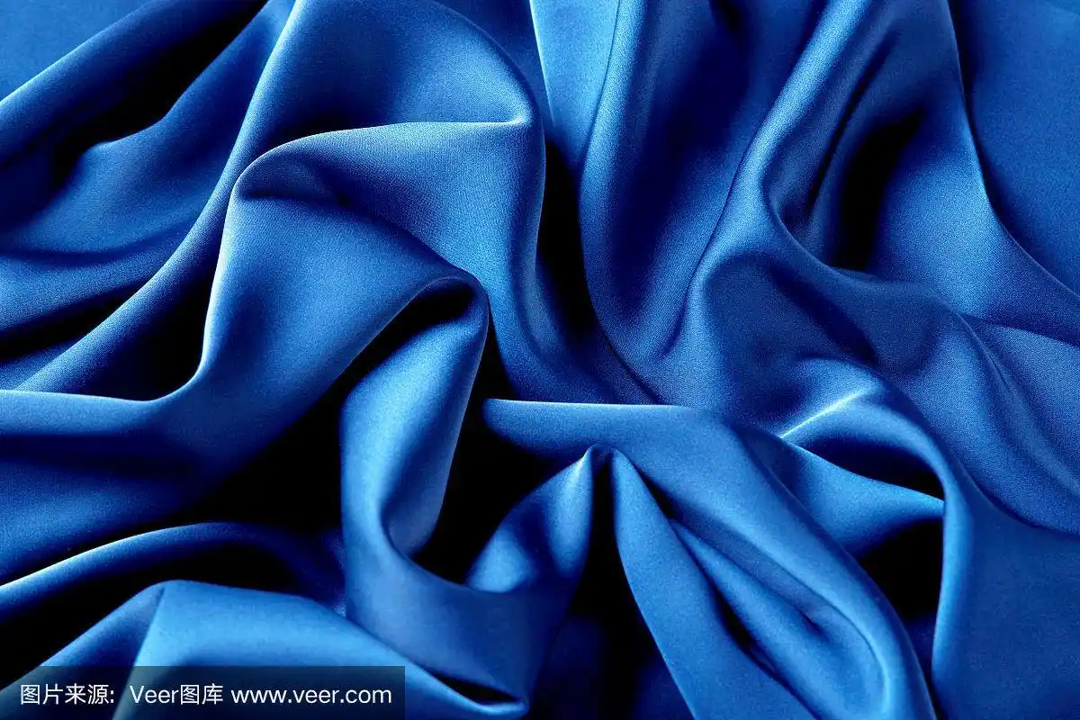蓝色宝蓝色丝织物背景,俯视图.