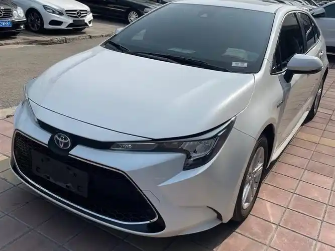 北京2021年06月丰田雷凌2021款双擎18hecvt豪华版白色自动档