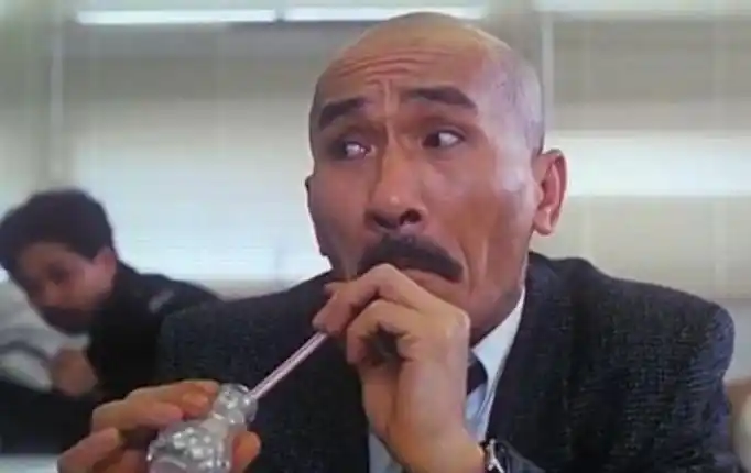 电影,演光头佬的那个人叫什么名字?