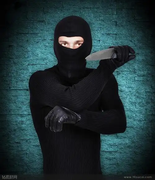 背景匕首挥舞匕首攻击黑色衣服黑色头套恐怖分子恐怖袭击高清摄影图片