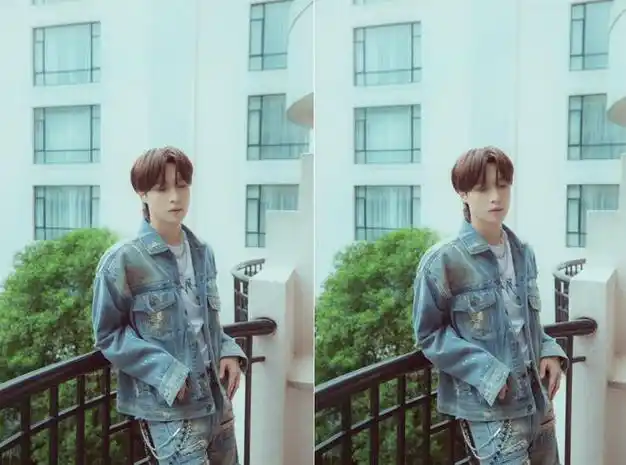 张艺兴换发型如换人,狼尾头配复古外套,靠栏杆随便摆pose都有型