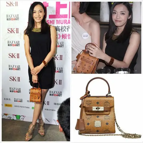 组图:大明星初夏挎包 王菲mcm铆钉版最抢眼