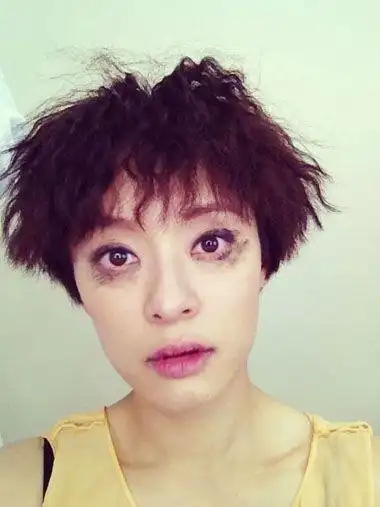 孙俪满头烫发图片 辣妈孙俪烫发发型图片(2)