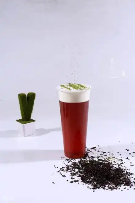 蜜桃乌龙奶盖茶