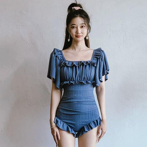 新款休闲温泉度假海边游泳衣保守遮肚显瘦纯色少女连体三角泳衣女