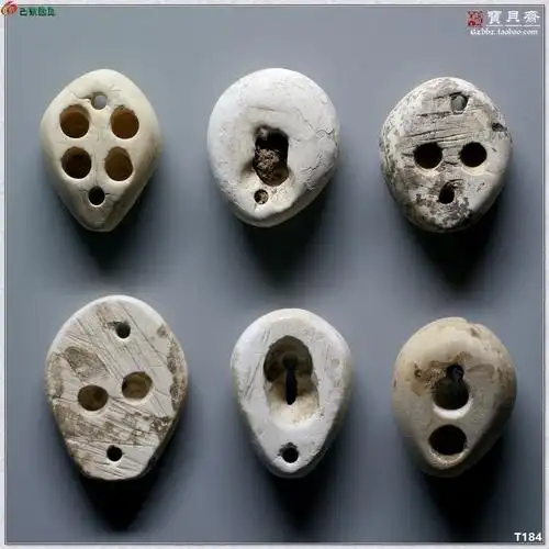 夏家店下层文化遗物鸡骨白玉贝几组