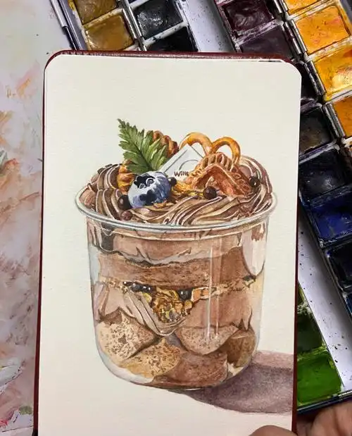 今天画了一款杯装的糕点奶昔(水彩)颜料:鲁本斯固体水彩画笔:秋宏斋