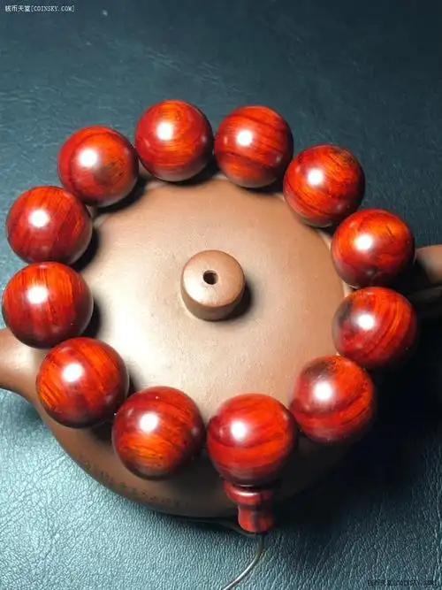 钱币天堂·交易区详情·玻璃底高油密犀牛角紫檀木段光紫檀手串1.