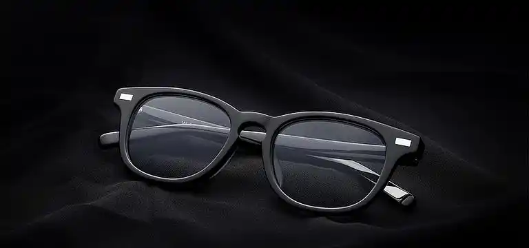 眼镜近视眼镜大气黑色海报背景