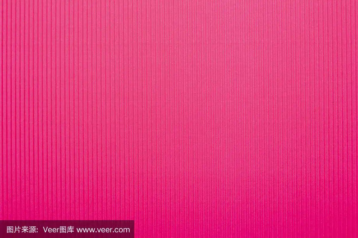 粉红色的背景纹理瓦楞纸板与自然突出.这张照片