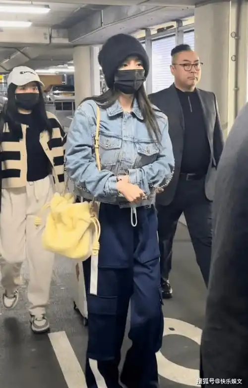 37岁杨幂现身英国伦敦机场!心情低落展现内心抗拒,引发粉丝担忧