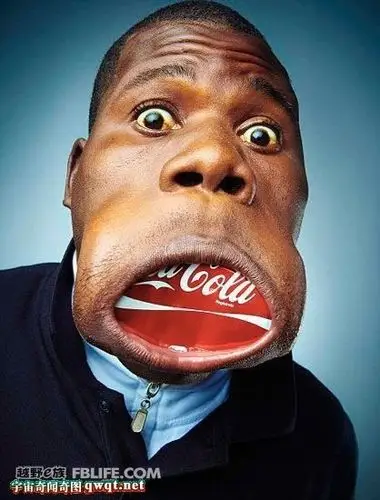 世界最宽大嘴巴:男子17厘米大嘴口含可乐罐