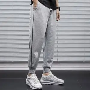 春季浅灰色针织运动裤男宽松大码束脚裤百搭松紧腰哈伦九分裤子潮
