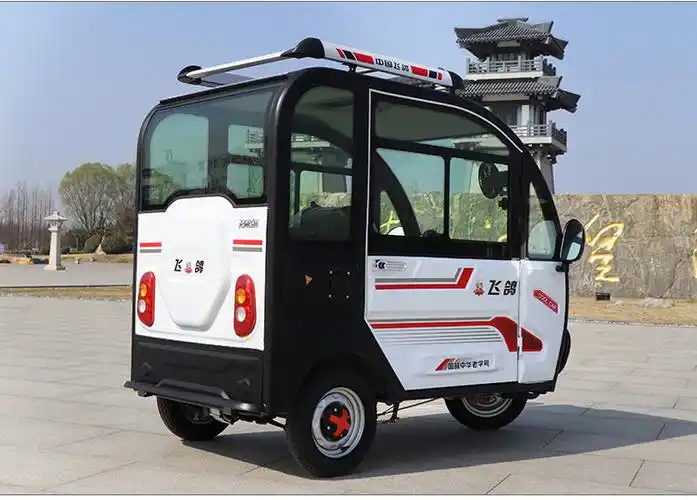 飞鸽新款电动三轮车家用全封闭式小型带棚国标可上牌照厂家直销裸车无