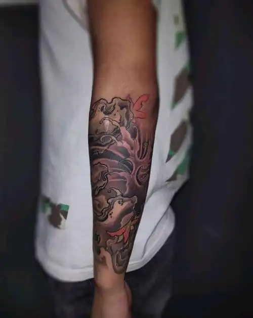 浪石半臂纹身图片手臂新传统纹身图案