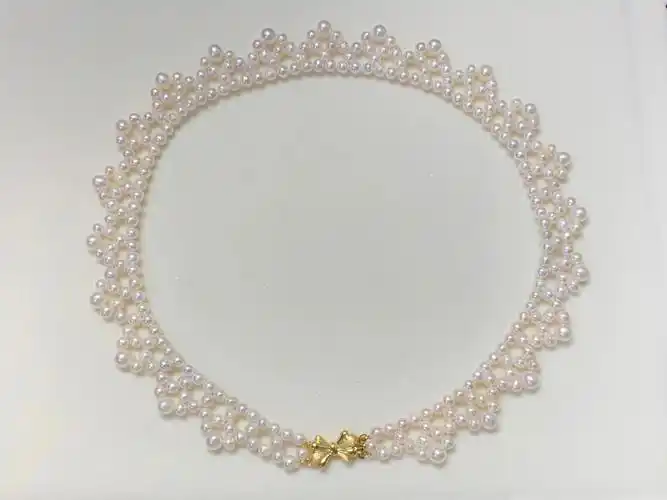 蕾丝款编织珍珠项链耐心已耗尽