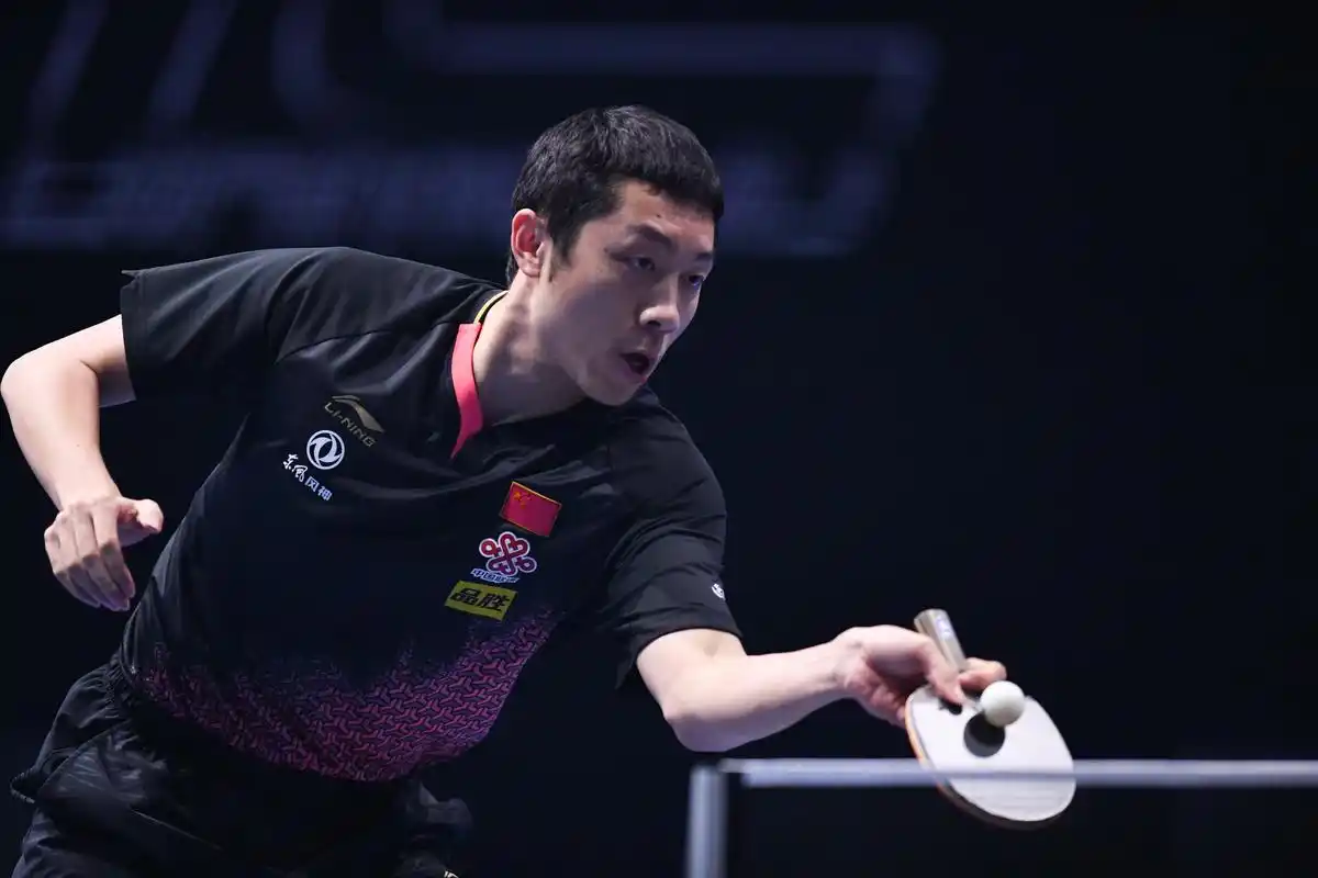 新华社照片,新山(马来西亚),2019年7月18日7月18日,许昕在比赛中回球.