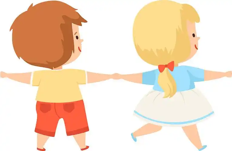 男孩和女孩手牵着手站着很可爱图片