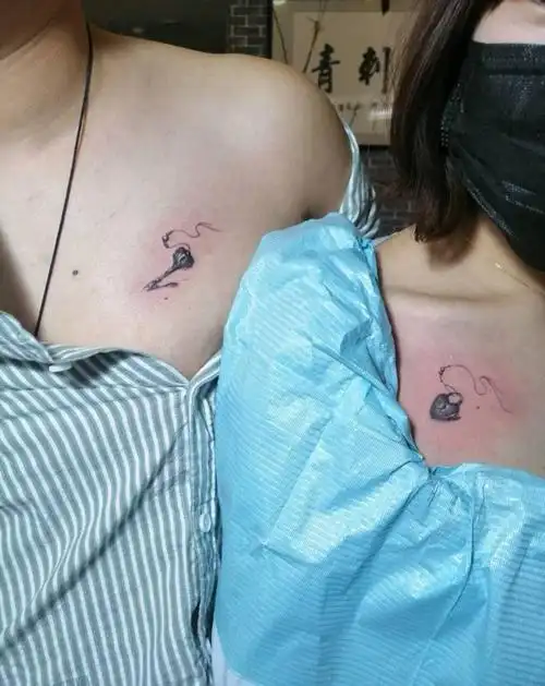 情侣图牵绊一生纹身图片_胸部纹身图案