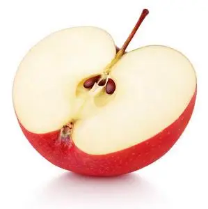 一半的红苹果果实照片