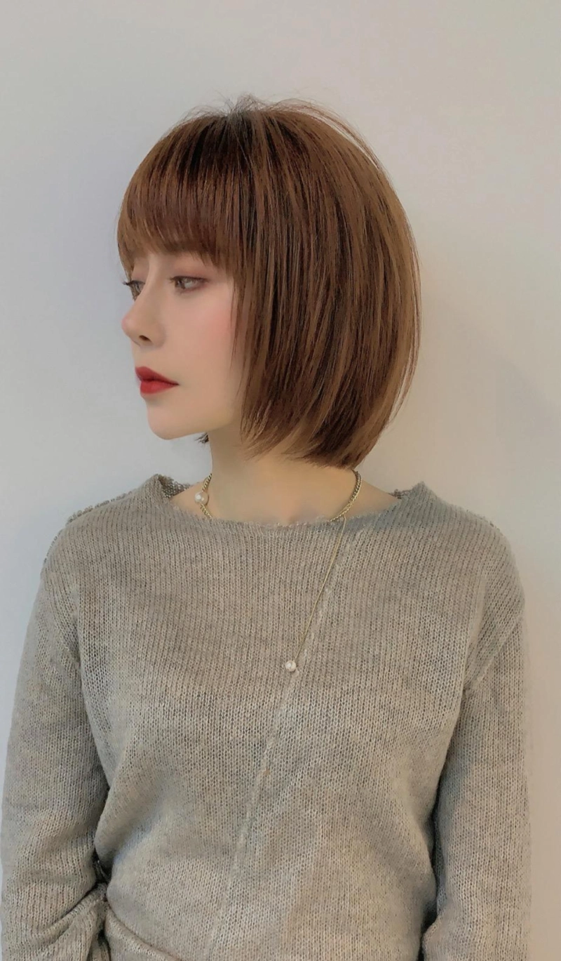 可以试试这种蓬松感的波波头,温柔时尚气质好,三七分的造型简单大方又