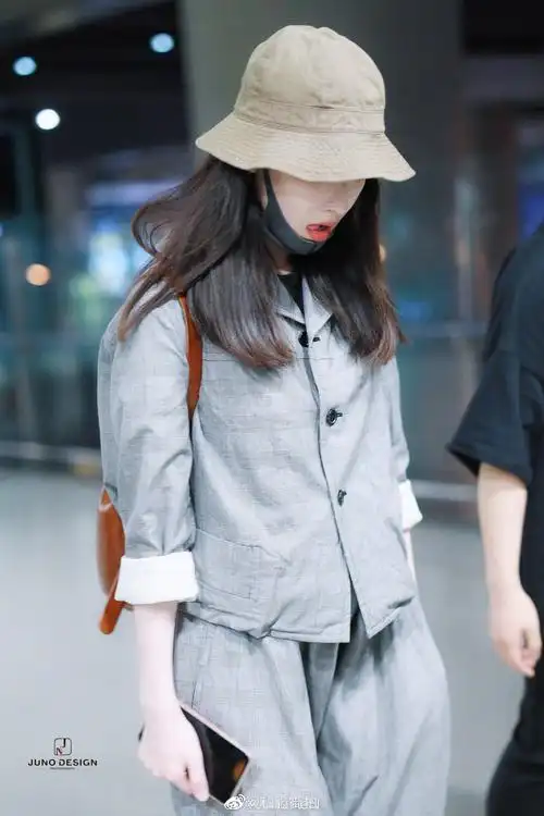 倪妮现身机场实力诠释什么是披麻袋都好看zt
