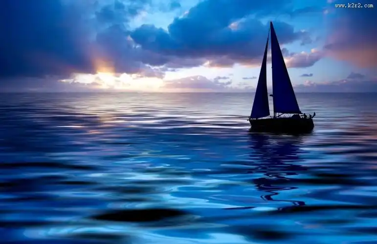 傍晚大海帆船航行图片第2张