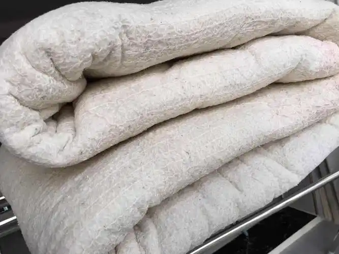 这样洗后的棉絮很容易晾晒干,干后自动膨松!       哈哈!非常好啊!