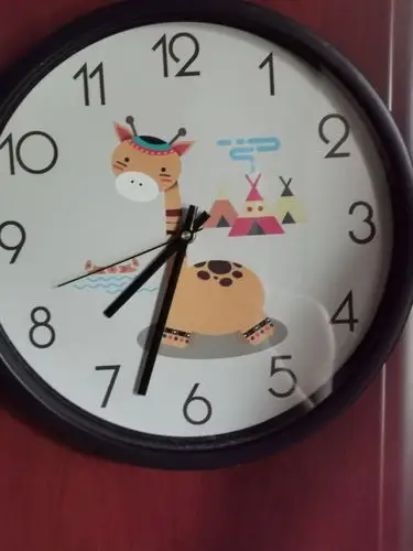 早起 "妈妈  时针在数字7  分针在数字6旁边一丢丢  7点半多啦!